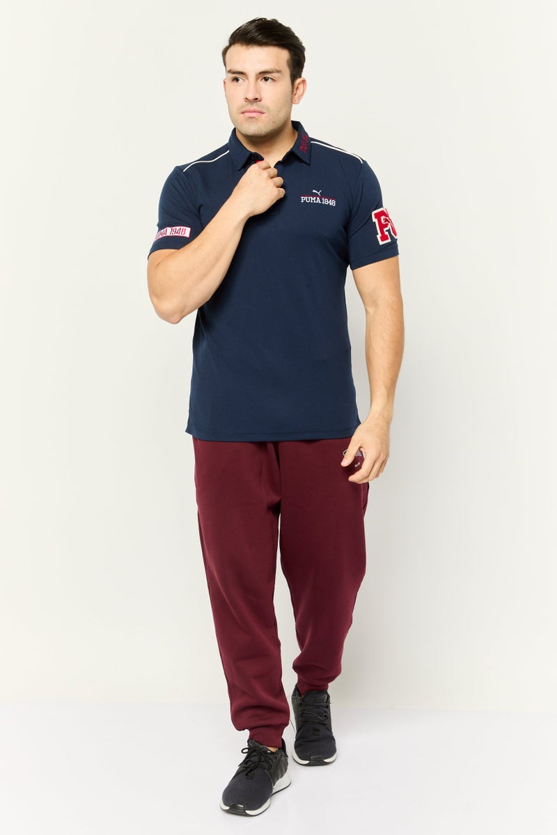 PUMA تي شيرت بولو جولف للرجال بأكمام قصيرة مزخرفة، لون كحلي - Image 2